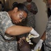 National Guard Medic Treats Infected Foot During Flintlock 09 Exercise