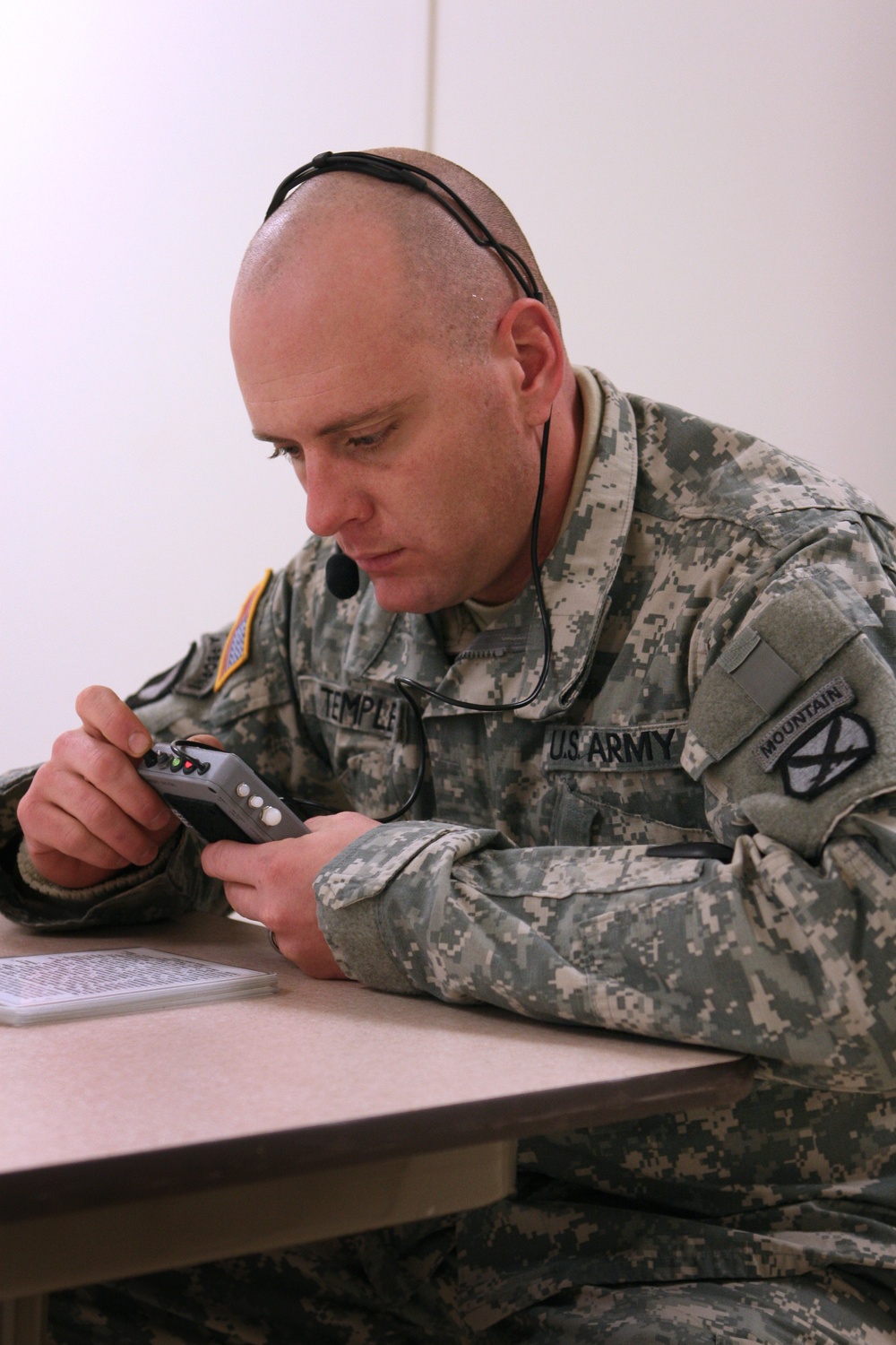 Army Sgt. Practices Using Voice Response Translator During Training