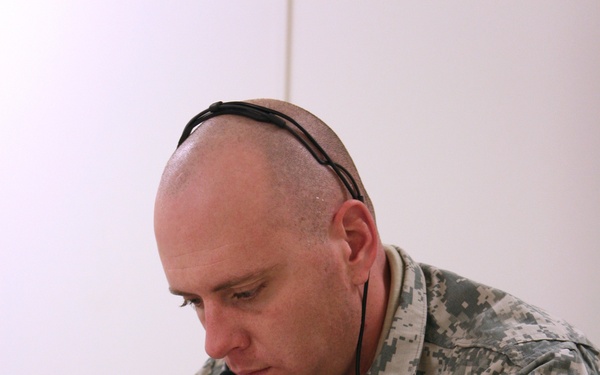 Army Sgt. Practices Using Voice Response Translator During Training