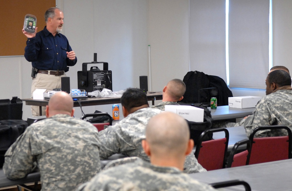 Specialist Trains Soldiers on Non-Lethal Devices at Fort Drum