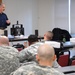 Specialist Trains Soldiers on Non-Lethal Devices at Fort Drum