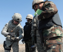 Army Explosive Ordnance Technician Demonstrates Car Bomb Fragments During Iraqi Security Forces Training