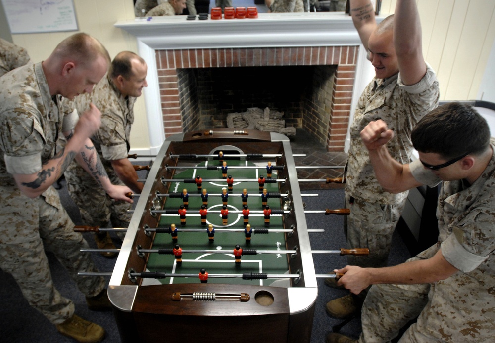 Marines Enjoy Foosball Game at Wounded Warrior Battalion East