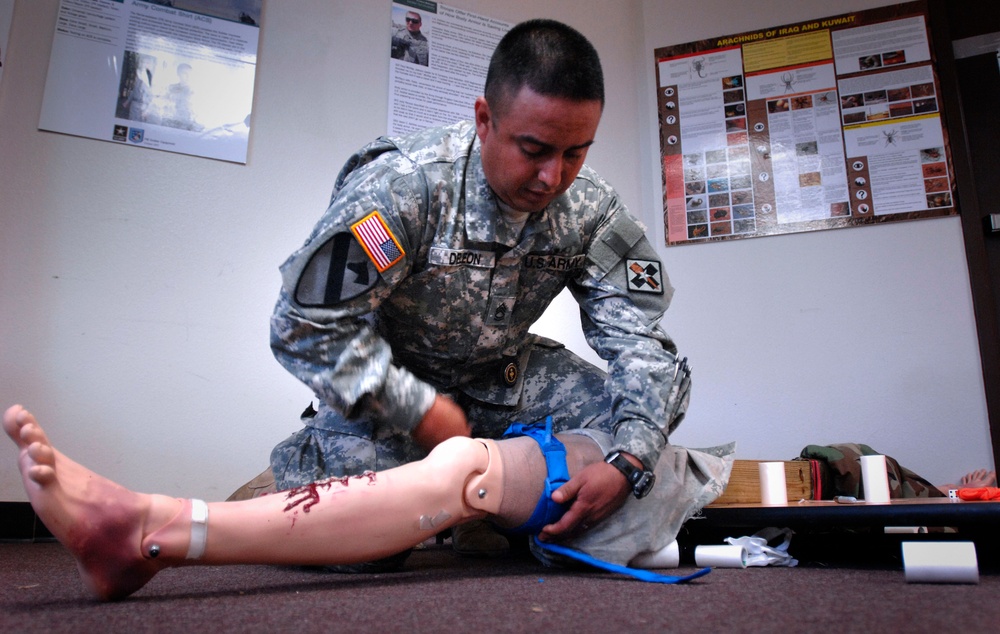 Combat Medic Demonstrates Lifesaving Tourniquet Technique