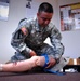 Combat Medic Demonstrates Lifesaving Tourniquet Technique