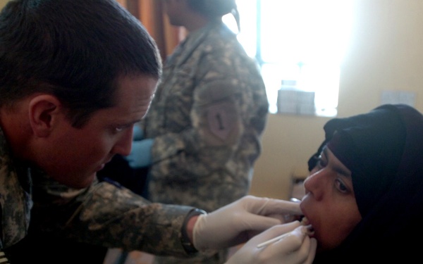 Soldiers Treat Ailing Iraqis