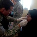 U.S. Army Captain Provides Medical Care to Iraqi Woman