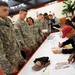 Soldiers Seek Autographs from USO Entertainers During Visit to Camp Casey, Korea