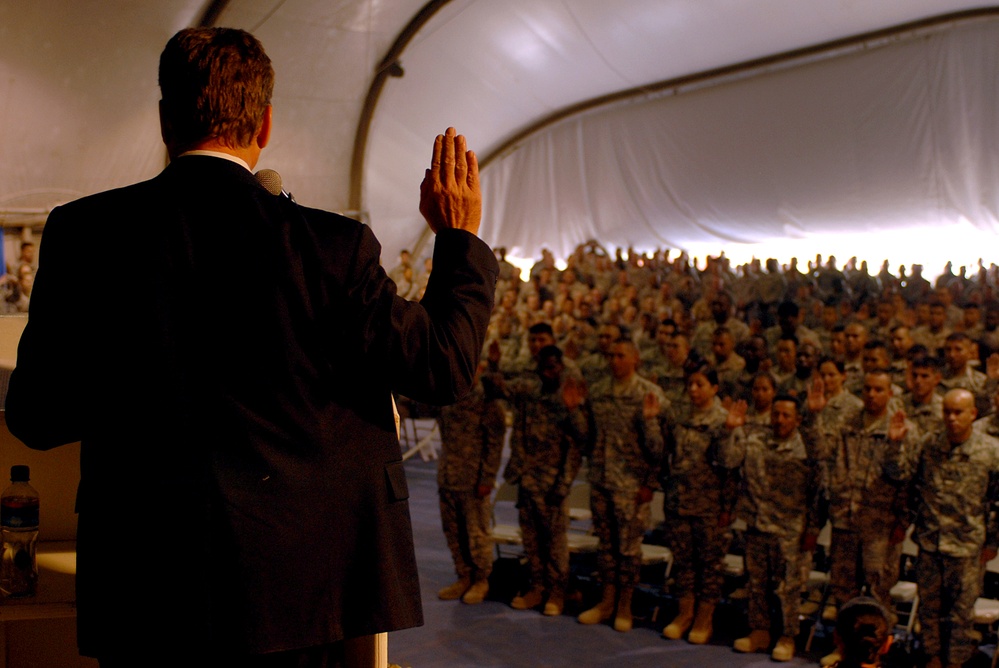 U.S. Citizenship and Immigration Services Official Administers Naturalization Oath to Servicemembers in Afghanistan