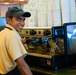 Barista Brews Espresso with a Smile at Green Beans Coffee in Iraq