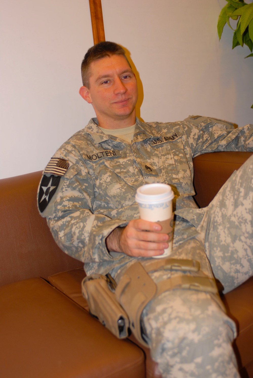 Army Staff Sgt. Relaxes at Camp Victory in Iraq