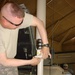 Army Sergeant Installs Antenna System During Electronic Warfare Training in Iraq