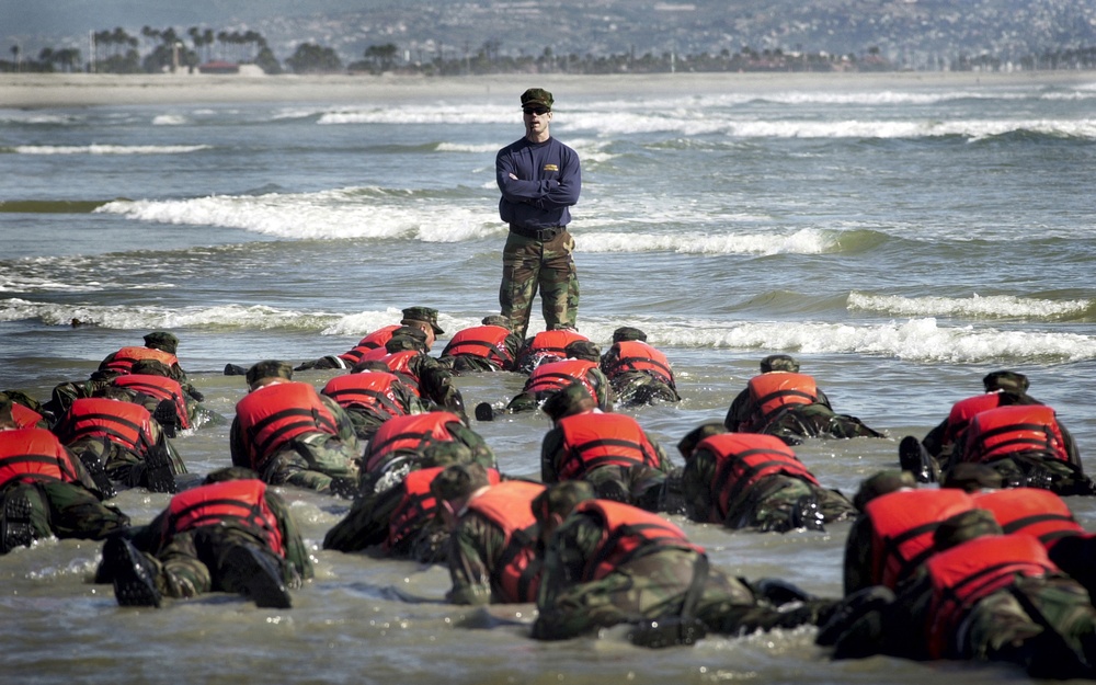 Navy SEAL Instructor Oversees Surf Drill Training at Naval Special Warfare Center