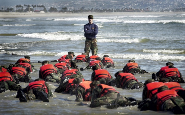 Navy SEAL Instructor Oversees Surf Drill Training at Naval Special Warfare Center