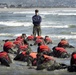 Navy SEAL Instructor Oversees Surf Drill Training at Naval Special Warfare Center