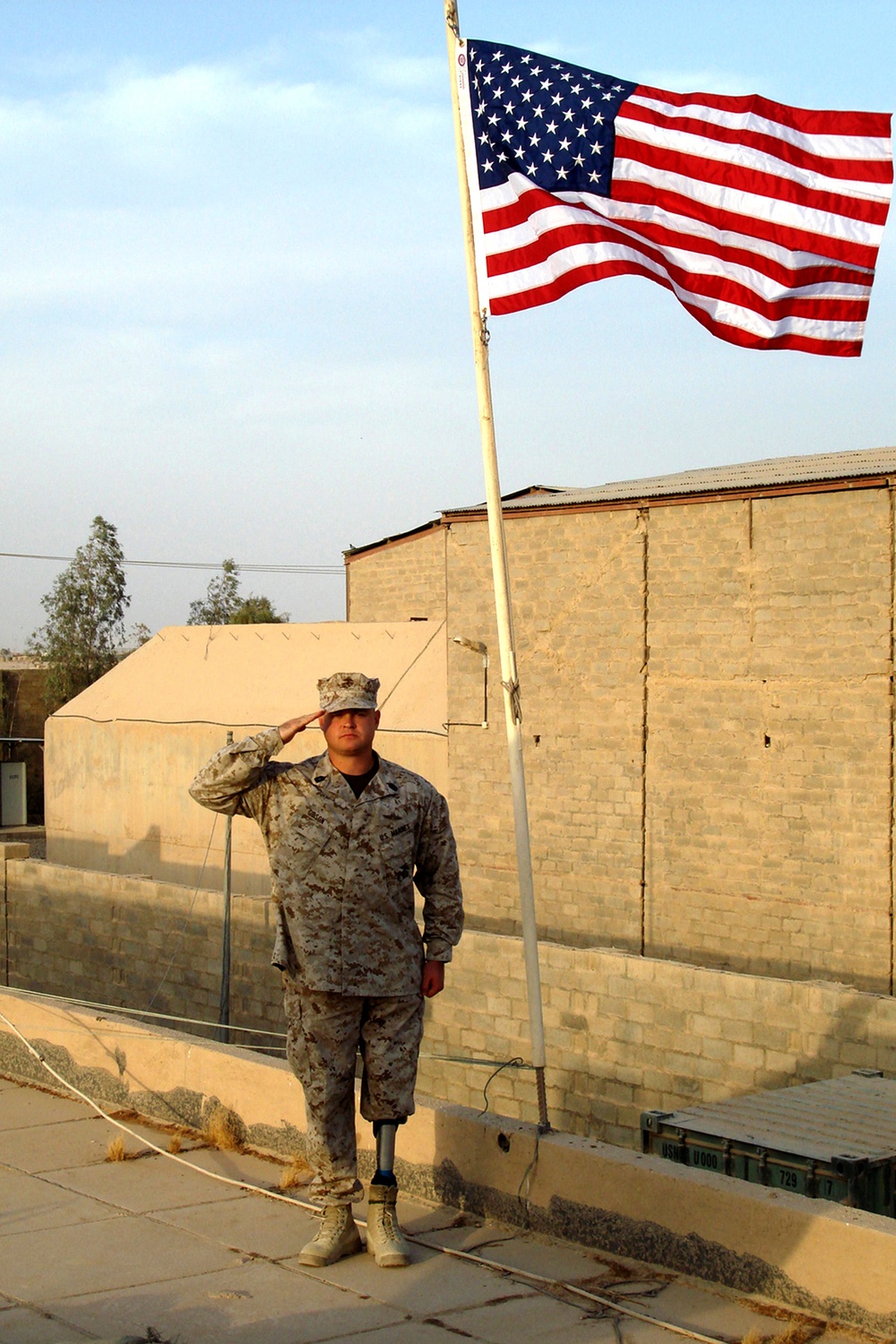 Marine Corps Master Sgt. Salutes with Prosthetic Leg in Iraq