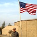 Marine Corps Master Sgt. Salutes with Prosthetic Leg in Iraq