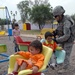 U.S. Soldier Brings Joy to Iraqi Children at Park Opening