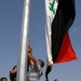 U.S. Army Commander Helps Raise Iraqi Flag at Baghdad Park Opening