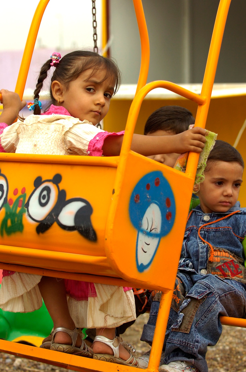 Children Enjoy New Swing at Dover Park Opening in Baghdad
