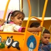 Children Enjoy New Swing at Dover Park Opening in Baghdad