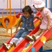 Girls Enjoy New Playground at Dover Park Opening in Baghdad