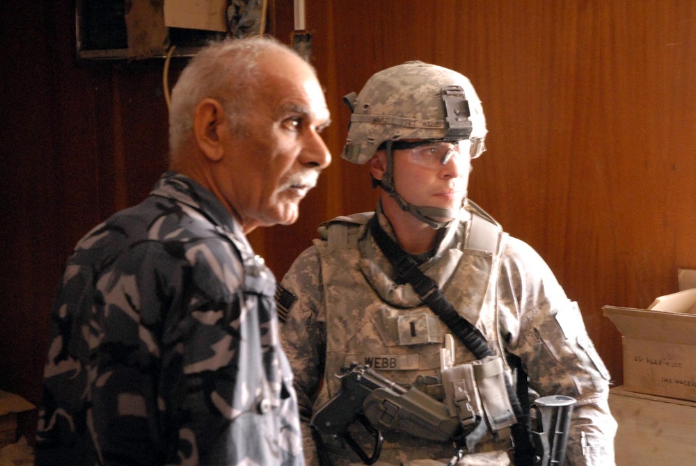 U.S. Army Officer Advises Iraqi Police on Arms Room Operations in Basra