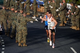 Army Officer and Mexican Runner Receive Water Support at Marine Corps Marathon