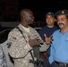 U.S. Army Translator Speaks with Iraqi Policeman in Kut