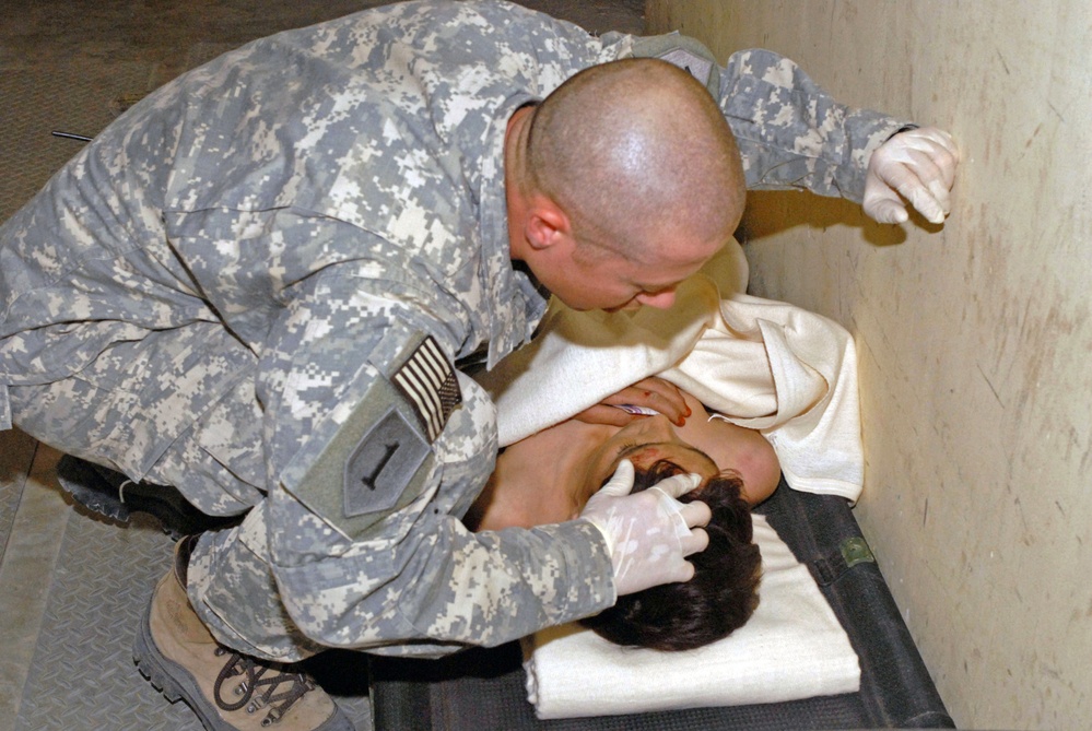 Army Medic Treats Afghan Boy Injured in Vehicle Rollover