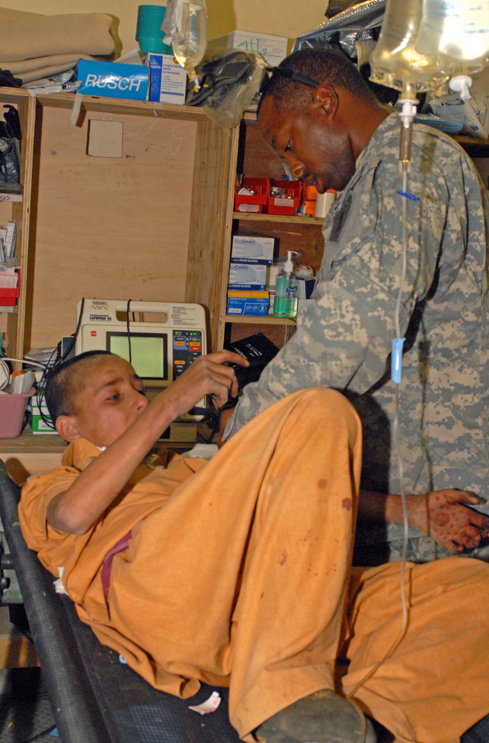 Army Medic Provides Care to Trauma Patient in Afghanistan