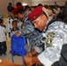 Iraqi Police Distribute School Supplies to Children in Baghdad