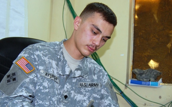 Army Clerk Maintains Rifle at Camp Taji in Iraq