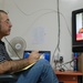 Linguist Monitors Arabic News for Coalition Forces in Iraq