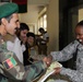 Navy Chief Petty Officer Helps Afghan Army Medical Corps Member Register for Leadership Seminar