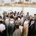 Army Lt. Col. Welcomes Sunni and Shiia Detainees Back to Communities in Iraq