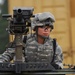 Military Police Soldier Stands Guard with Grenade Launcher