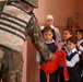 Iraqi Soldier Assists Student at Baghdad School