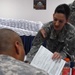 Army Paralegal Assists Soldier with Voter Registration in Iraq