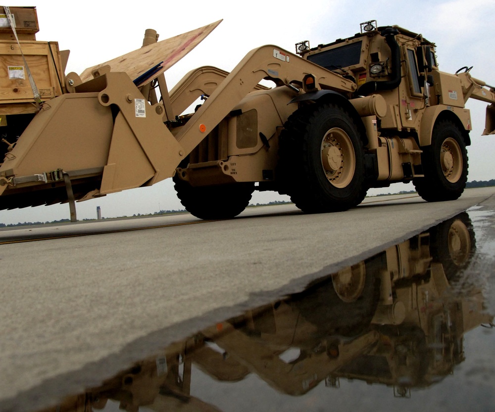 Army Engineer Excavator Loaded Onto C-5 Galaxy for Deployment