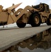 Army Engineer Excavator Loaded Onto C-5 Galaxy for Deployment