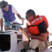 Challenged America Volunteer Teaches Soldier to Sail