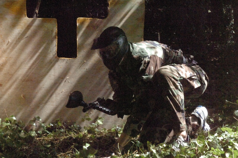 Soldier Ducks for Cover During Paintball Competition in Vicenza
