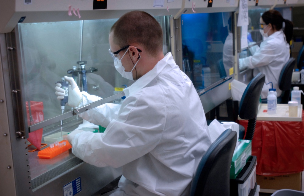 Mitochondrial DNA Technicians Amplify Samples at Armed Forces Lab