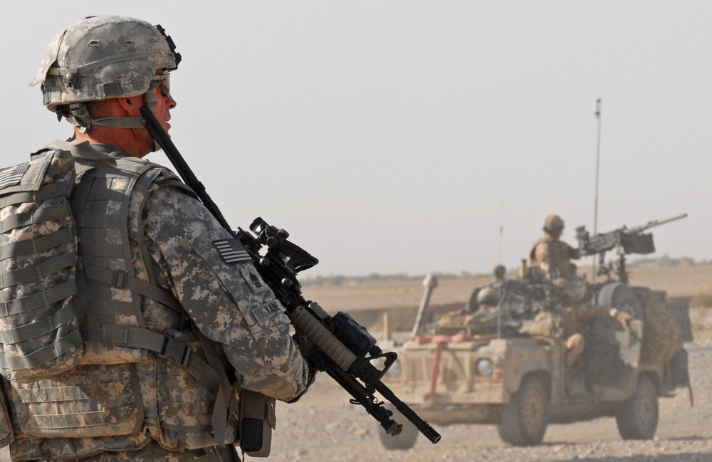 Army NCO Leads Convoy Transporting Turbine Materials into Afghanistan