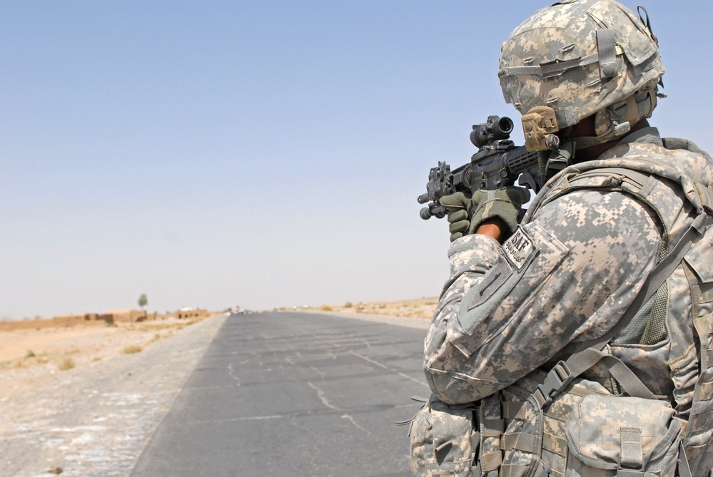 U.S. Soldier Secures Convoy Transporting Turbine Materials in Afghanistan