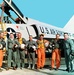 Original Mercury Astronauts Pose with Air Force Jet
