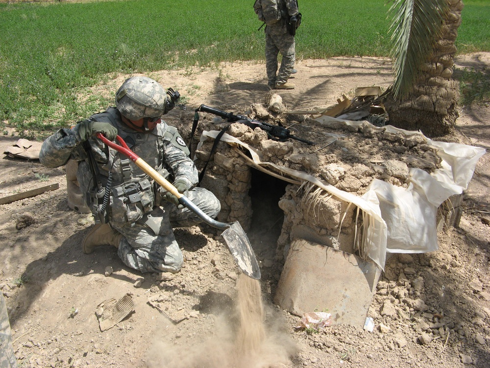 Army Sergeant Searches for Hidden Weapons Caches in Iraq