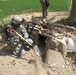 Army Sergeant Searches for Hidden Weapons Caches in Iraq