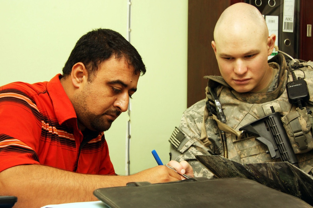 U.S. Army Officer Discusses Contracts with Iraqi Official in Tarmiyah
